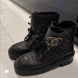 CHANEL Black Quilted Leather Combat Boots with Gold Chain CC Logo